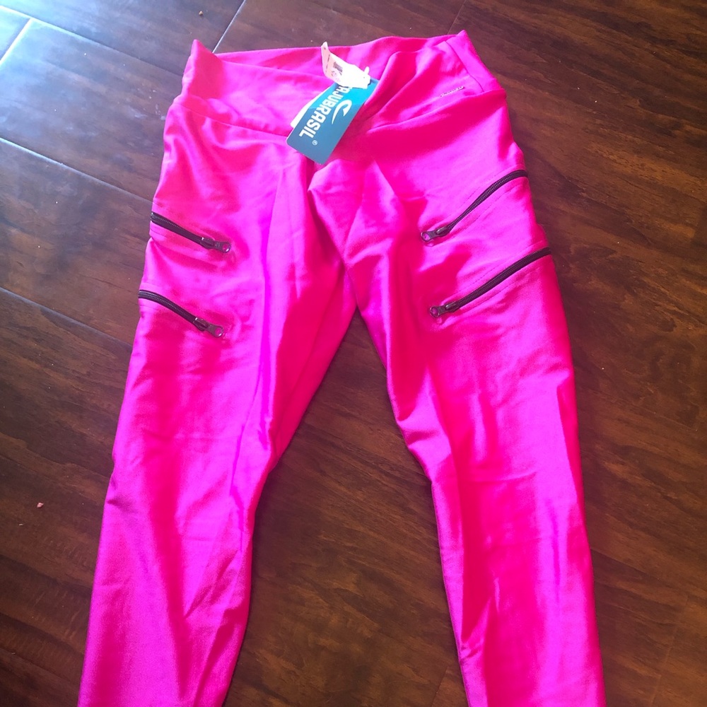 Fucsia pink pants with zippers... super cute